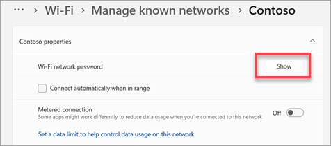 The Windows 11 Settings page for a Wi-Fi network, with the Show button next to 'Wi-Fi network password' highlighted in red.